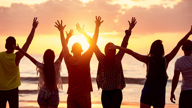 Group of people at sunset