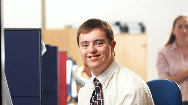 a young man happy at work